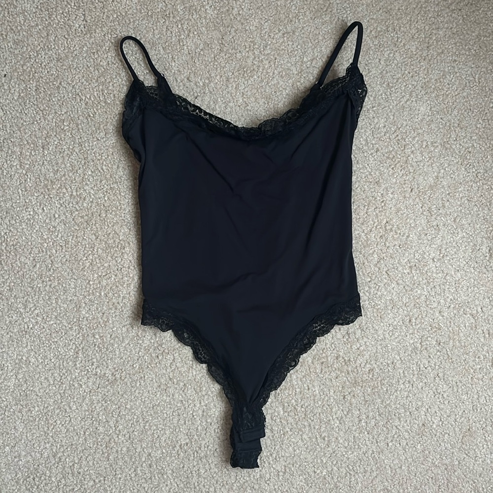 Lace trim bodysuit
